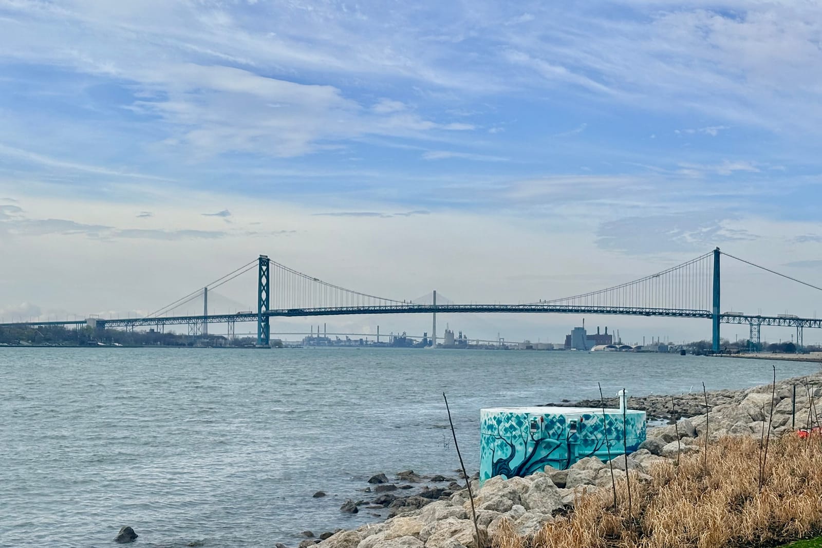 The Ambassador Bridge in the foreground with the Gordie Howe International Bridge far behind, Detroit-Windsor, April 2026.