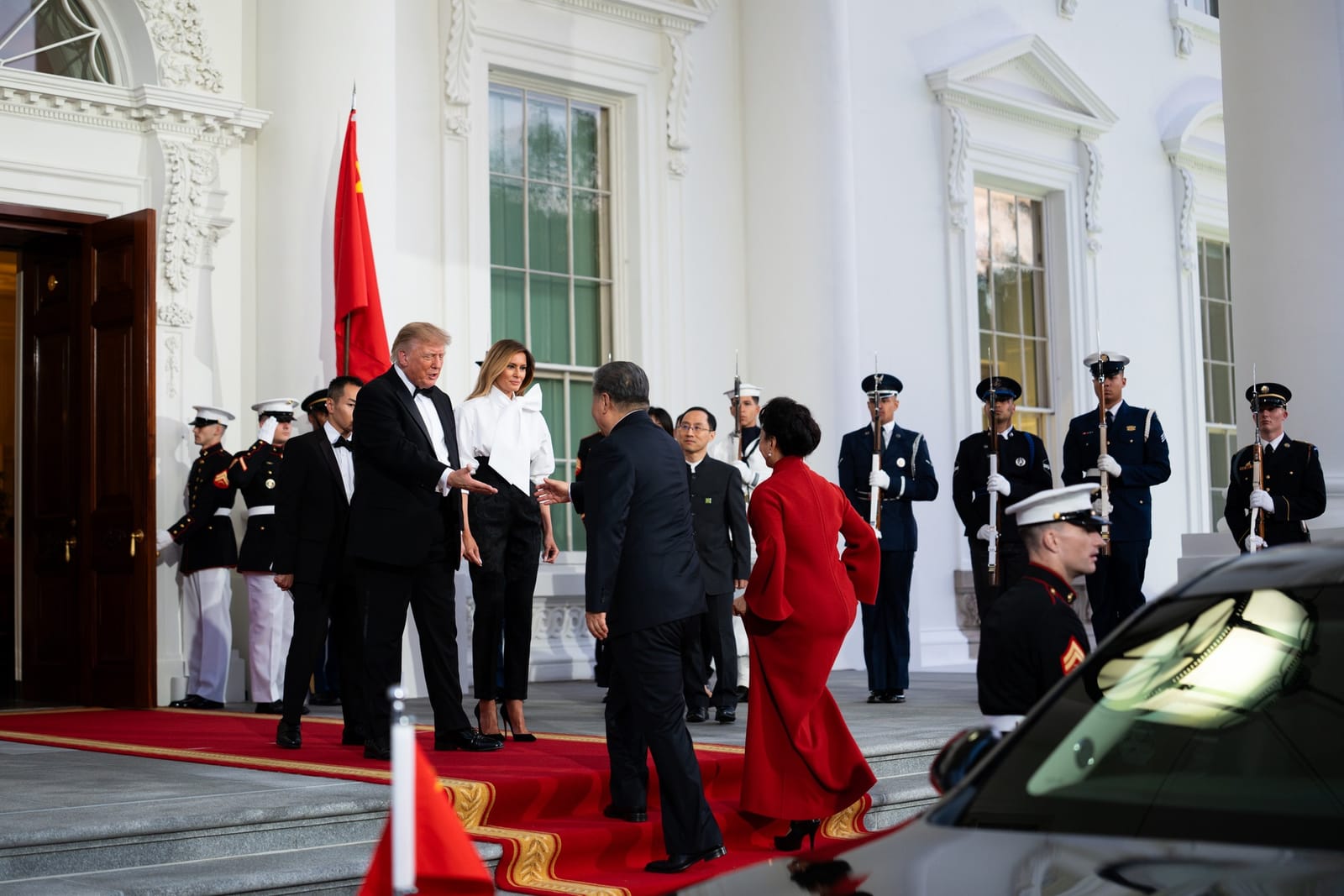 Trump and Melania Trump greet Xi Jinping and Peng Liyuan at the South Portico during the State Arrival ceremony, 24 September 2026.